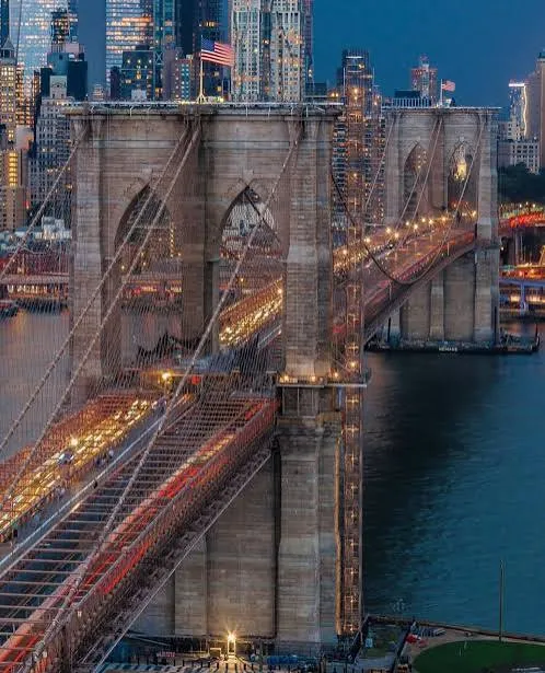 Brooklyn Bridge and Manhattan skyline at dusk